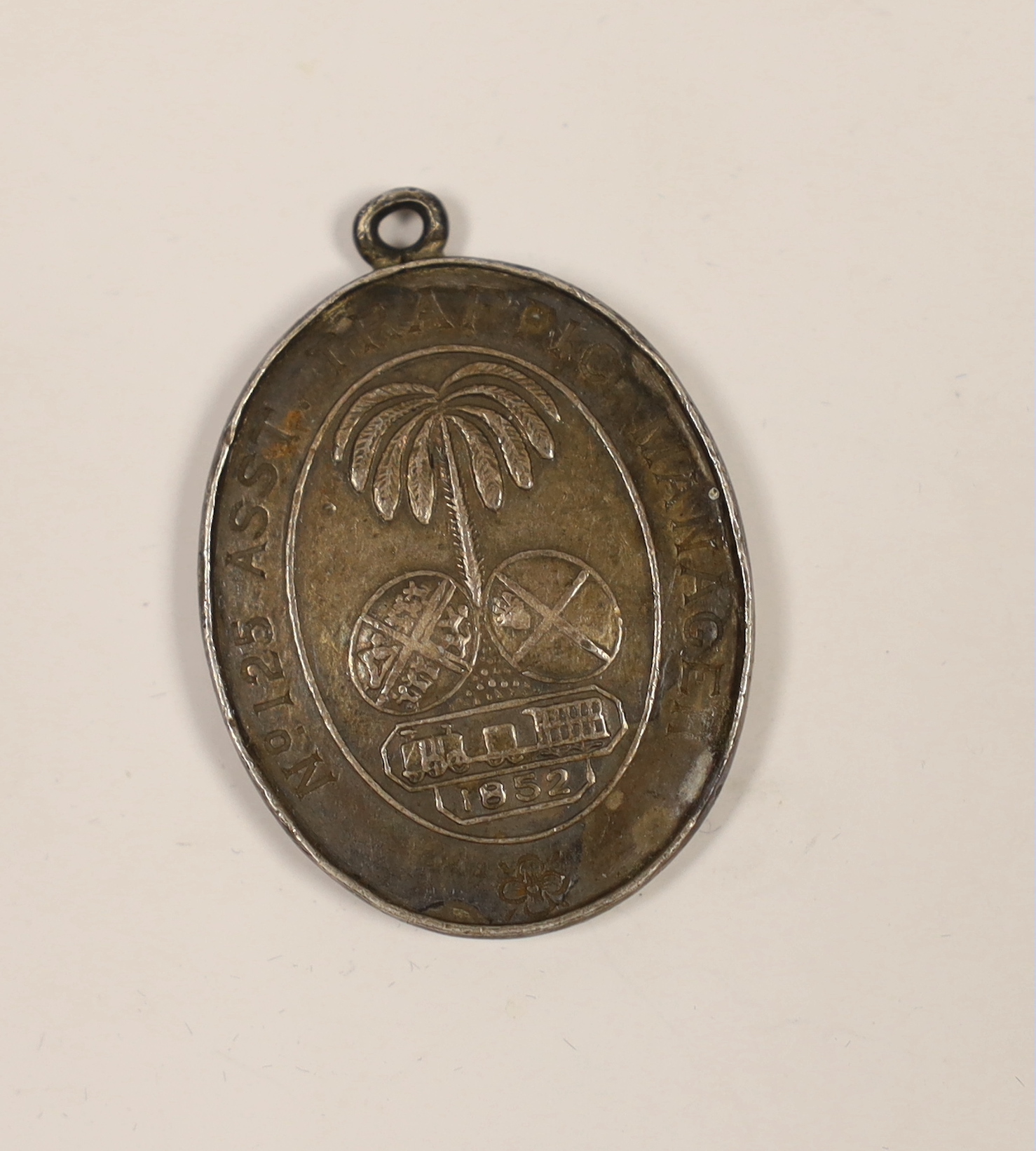 A scarce ‘Madras Railway Company free pass’ medallion, dated 1852, engraved ‘No125 ASST. TRAFFIC MANAGER’